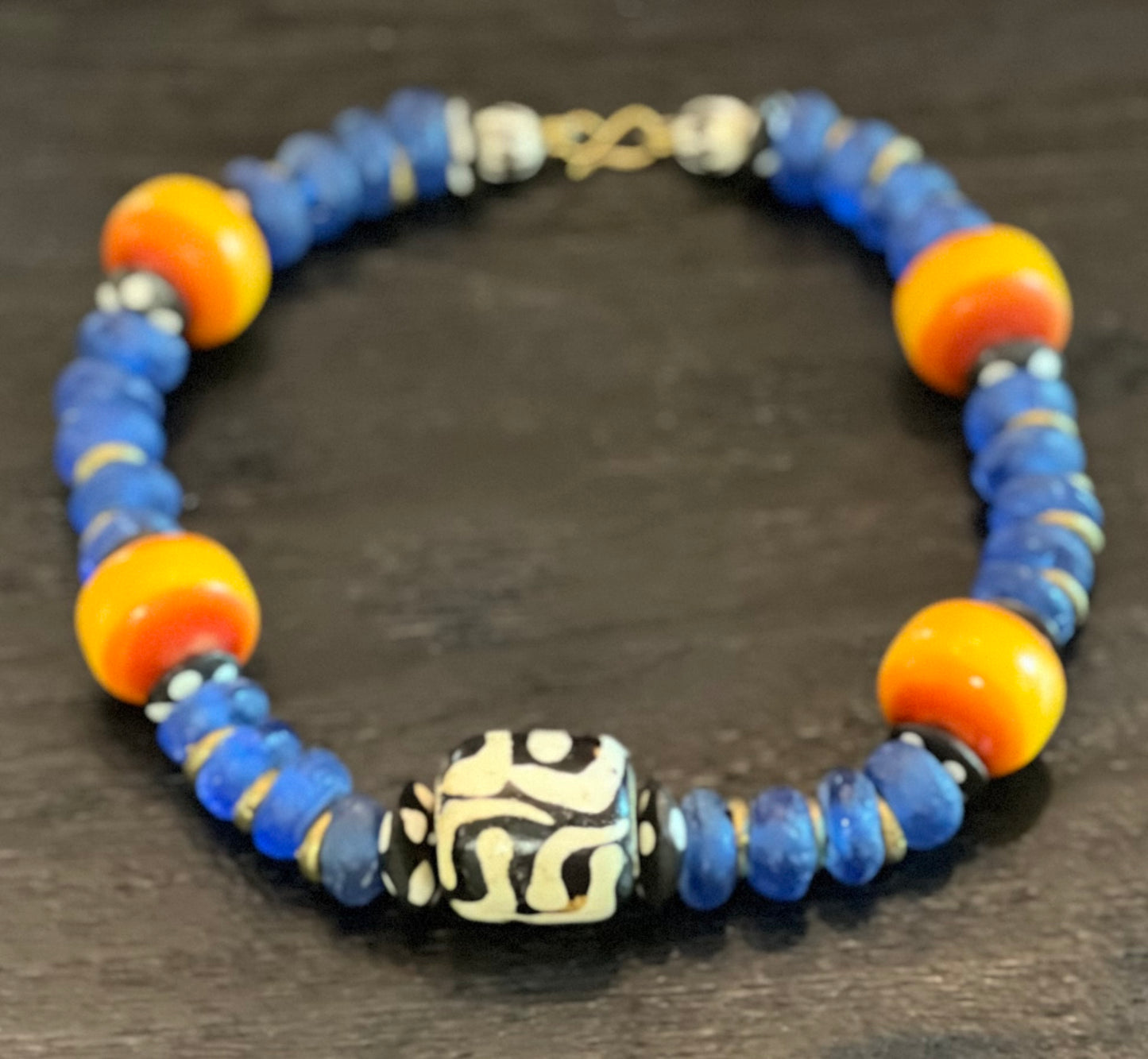 Manifest: Cobalt Glass Beaded Necklace Featuring “Mudcloth” Bead and Earring Set